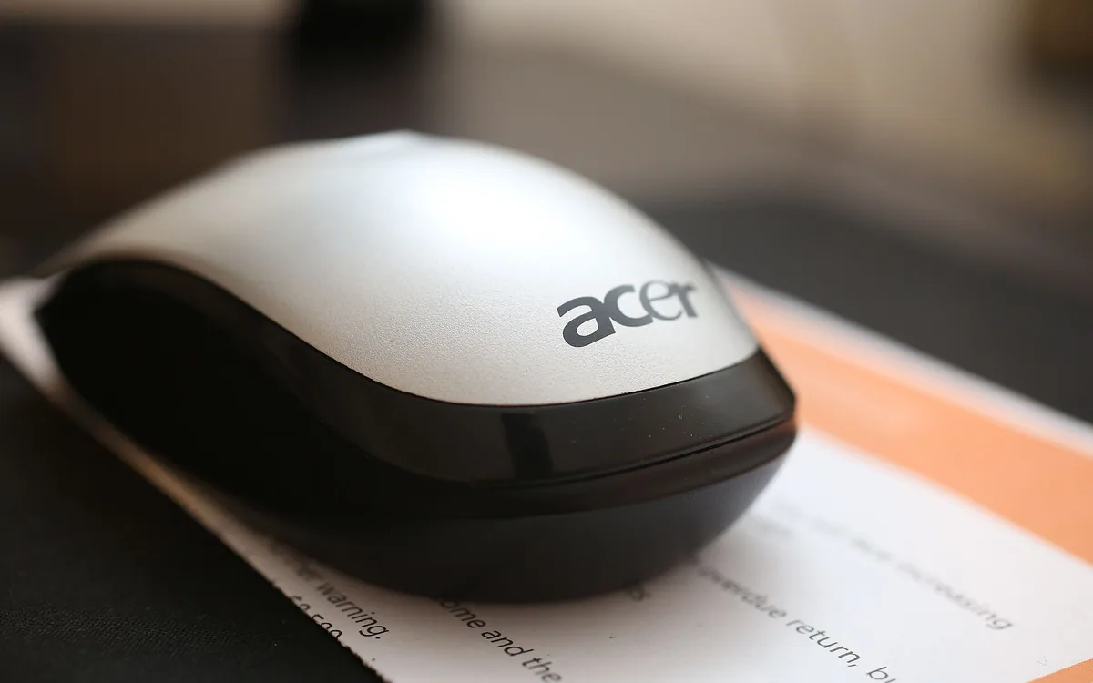 Acer computer mouse on paper